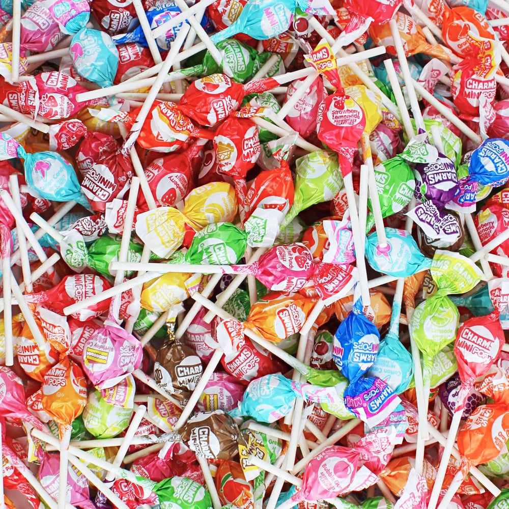 QUEEN CITY CANDY CAVE front packaging showing assorted Charms mini pops and branding benefit convenience