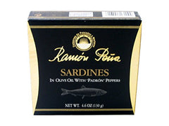 Ramon Peña front tin opened showing sardines in oil and Padron pepper for gourmet serving