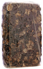 Rani tamarind block soaked in bowl demonstrating easy pulp extraction for chutney
