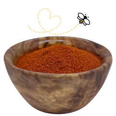Raw Essentials powder close-up of fine texture and rusty red color, shows quality
