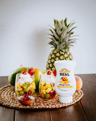 Reàl Infused Exotics coconut bottle label detail, clearly communicates real fruit content