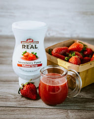 Reàl Infused Exotics strawberry puree mixed into an Italian soda for bright flavor