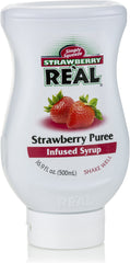 Reàl Infused Exotics being poured into a cocktail showing vivid strawberry flavor boost