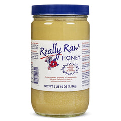 Really Raw jar front view showing natural unfiltered honey and family-farm label
