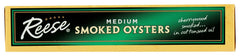 Reese smoked oysters plated on crackers with lemon — quick entertaining option