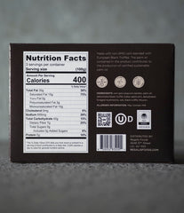 Regalis Foods popcorn and unpopped kernels showing texture and non-GMO corn quality