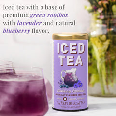 Glass of The Republic of Tea violet-hued iced tea over ice showcasing vibrant color and refreshment