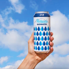 Richard's Rainwater pack of 12 cans staged for storage and event convenience