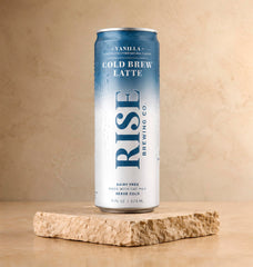 RISE Brewing Co. close-up of oat milk texture blending with cold brew, creamy plant-based richness