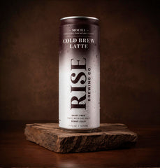 RISE Brewing Co. close-up of mocha latte texture and oat milk creaminess highlighting smooth mouthfeel