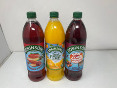 Robinsons apple and blackcurrant being poured into a glass offering fruity refreshment