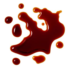 Roland Premium Soy Sauce in kitchen beside bowl and chopsticks, helps quick meal seasoning