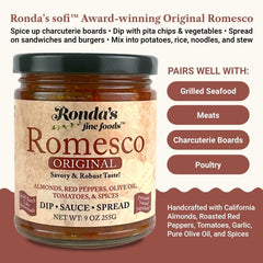Ronda's Fine Foods spoon lifting chunky romesco highlighting texture and spreadability