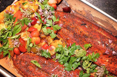 Raw salmon fillet coated with Rub with Love for even seasoning before cooking