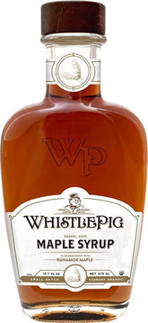 Runamok x WhistlePig bottle front view showing amber syrup and premium labeling for finishing dishes