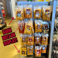 Bowl of RunninWild BBQ Korn Nutz on table, ideal for party snacking and sharing