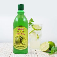 Sadaf lime juice Shiraz pouring into a glass with measuring spoon showing precise flavor control