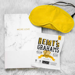 Single-serve Remy's Honey Grahams bag by The Safe + Fair Food Company for easy portioning