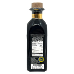 Sanniti balsamic pouring from bottle showcasing syrupy consistency and glossy finish benefit