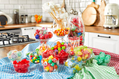 Sarah's Candy Factory spoon serving candies from jar, convenient portioning