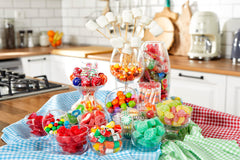 Sarah's Candy Factory jar beside common items to show 6 lb scale
