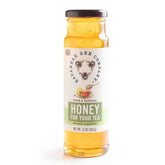 Savannah Bee Company jar front packaging showing brand and 12 oz honey benefit clarity