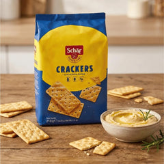 Schär crackers on a board with cheese showing versatile pairing benefit