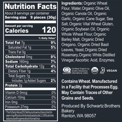 Schwartz Brothers bagel chips dunked in hummus showing sturdy chip for dipping