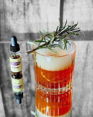 Scrappy's Black Lemon bottle with visible citrus zest for bright tang benefit
