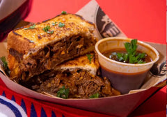 Seasoning Bombs shredded birria on tacos demonstrating juicy, seasoned meat