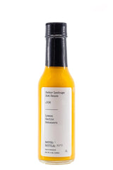 Señor Lechuga front bottle showing label and vibrant color, highlighting gourmet flavor
