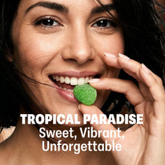 Shameless scattered gummies displaying five tropical flavors for variety
