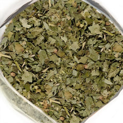 Siberian Green brewed cup of black currant leaf tea illustrating warm, caffeine-free comfort