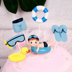 Simple polymer toppers beside a coin to show scale and easy placement on cakes