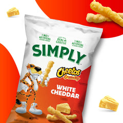 Simply Cheetos close-up of white cheddar powder, bold savory flavor