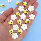 SIMPLY SUCRÉ front packaging showing 16 icing bees and daisies, ready to decorate