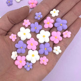 SIMPLY SUCRÉ front packaging showing 54 royal icing blossoms and bulk value