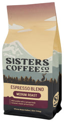 Sisters Coffee Company beans ground and in pour-over setup demonstrating brewing versatility and clarity