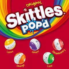 skittles pop'd open share bag spilling crunchy candies, brand snackability for travel