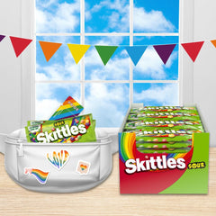 SKITTLES sour hand holding pack showing portable snack convenience