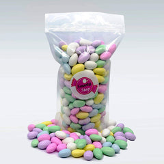 Close-up of Smarty Stop candy shell texture showing smooth pastel coating and crunch