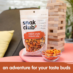 Snak Club detail of Cajun and honey sesame sticks showing seasoning and savory appeal