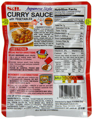 S&B curry poured over rice close-up, rich sauce and vegetables enhance meals