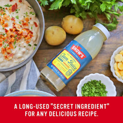 Snow's bottle held in hand to show 8 fl oz size and single-serve convenience