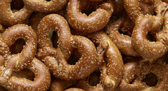 Snyder's of Hanover pretzels on board with dips illustrating serving ideas