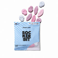 Sockerbit close-up of foamy lips and skull texture, highlighting soft chew and sour coating
