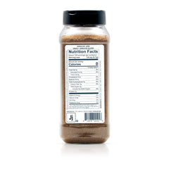 Spiceology rub being poured from jar highlighting easy application and generous bulk size