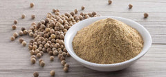 Spicy World close-up of fine white pepper grind showing texture and consistency