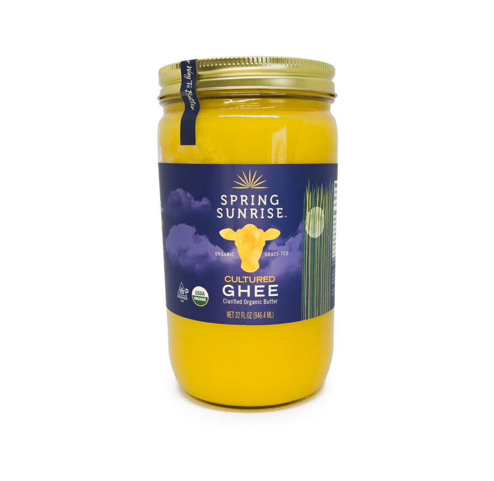 Spring Sunrise ghee front glass jar showing rich golden color and cooking versatility