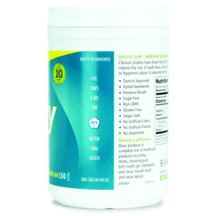 Open Spry container with visible wintergreen pieces ready for daily freshening